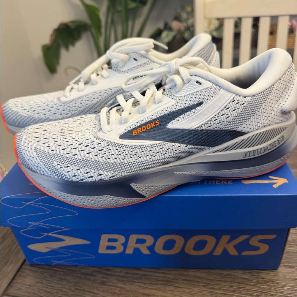 Brooks White and Gray Athletic Shoes with Orange Accents